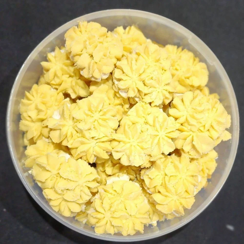 Almond cream biscuits piped in a tub