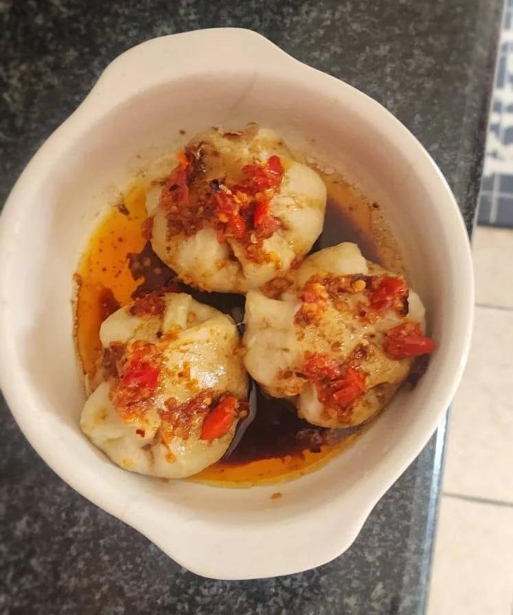 Chinese dumplings with soy glaze and chilli oil