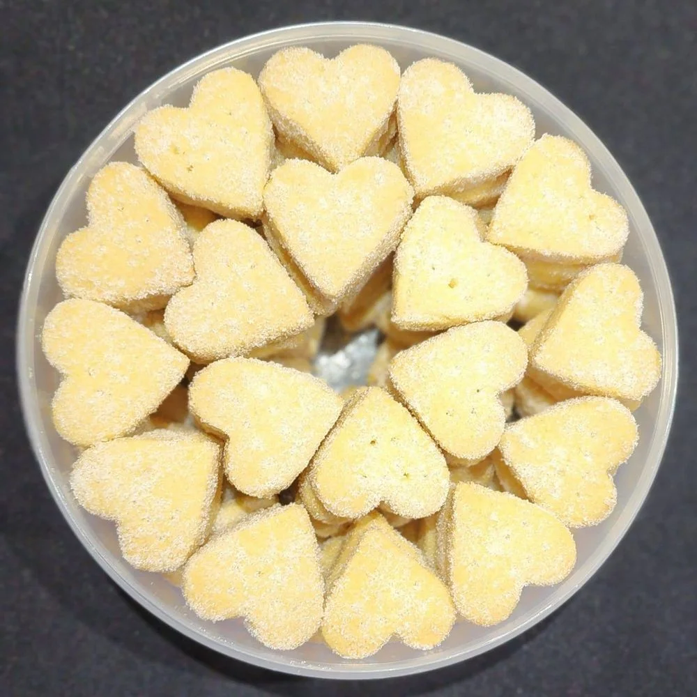 Heart-shaped shortbread in a tub